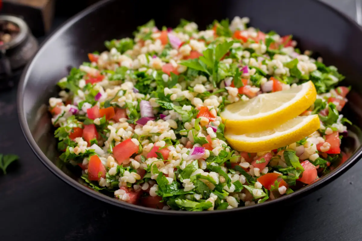 Freshly prepared Tabbouleh Salad with vibrant parsley and tomatoes.